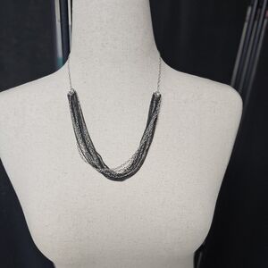 Sleek Silver C-Shaped Necklace with Polished Finish